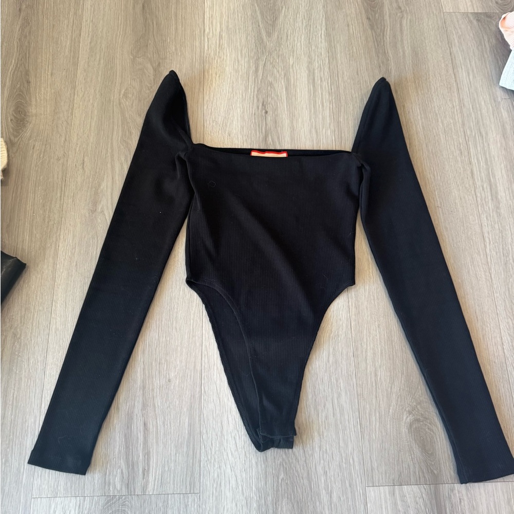 Atoir Black Garment with Red Label